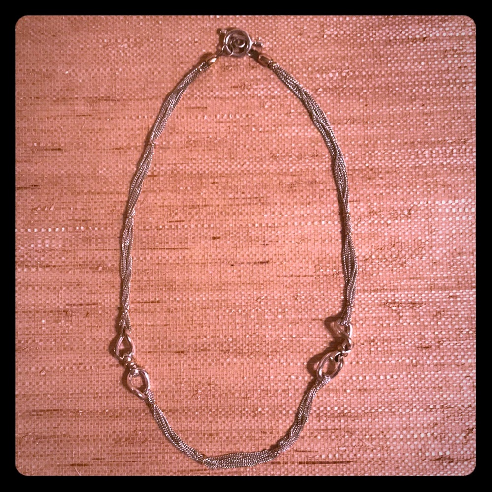 Silver necklace.